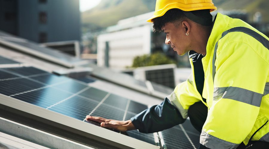 solar-panels-cell-and-install-with-man-in-city-for-HNDRMK4.jpg